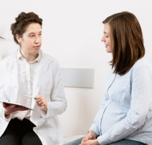 A doctor discussing something with patient