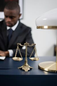 Set of old fashioned scales on a desk with blurred image background